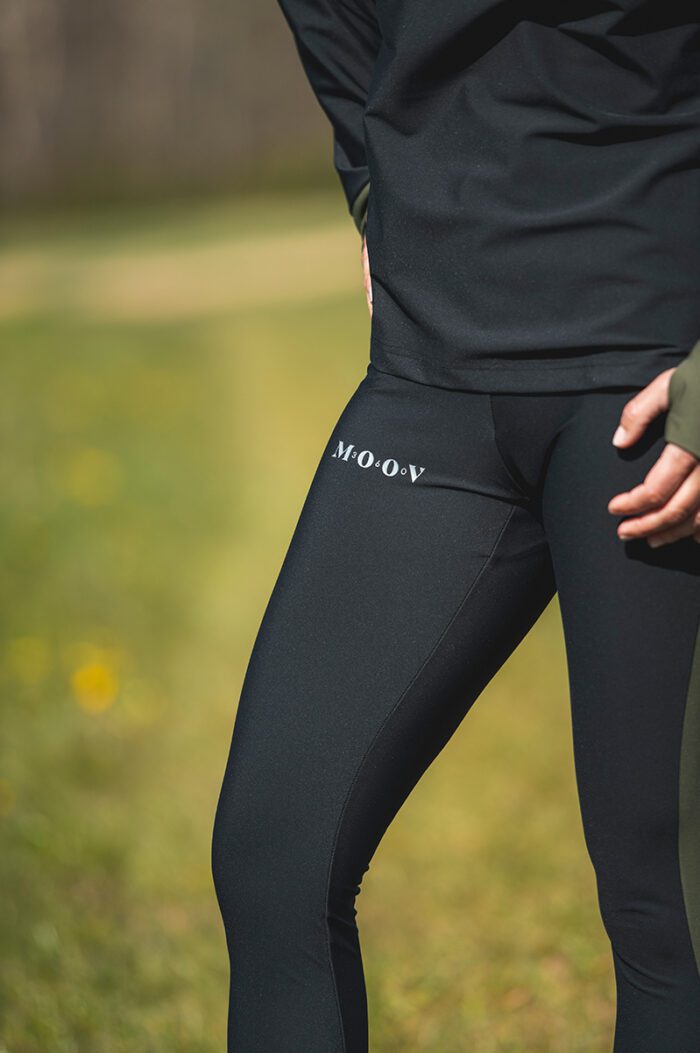 Woman wearing fitness clothing detail shot Black - Khaki